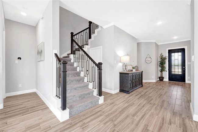 Upgraded stair railing and custom front door | Image 14