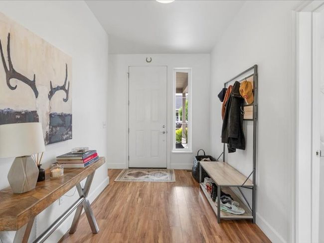 Entryway with wood finished floors and baseboards | Image 18