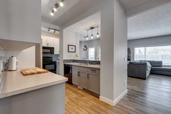 114 Chapalina Close Se, Home with 5 bedrooms, 3 bathrooms and 4 parking in Calgary AB | Image 4
