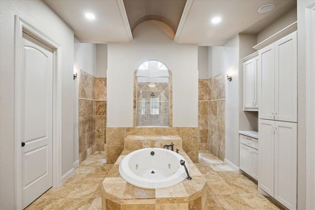 His and Her Separate Closets, Huge Walk-In Multi Head Shower and Soaking Tub | Image 23
