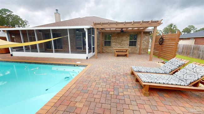 7445 Brevard St, House other with 4 bedrooms, 3 bathrooms and 6 parking in Navarre FL | Image 35
