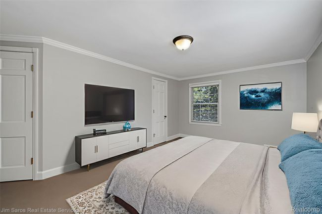 Bedroom with crown molding | Image 25