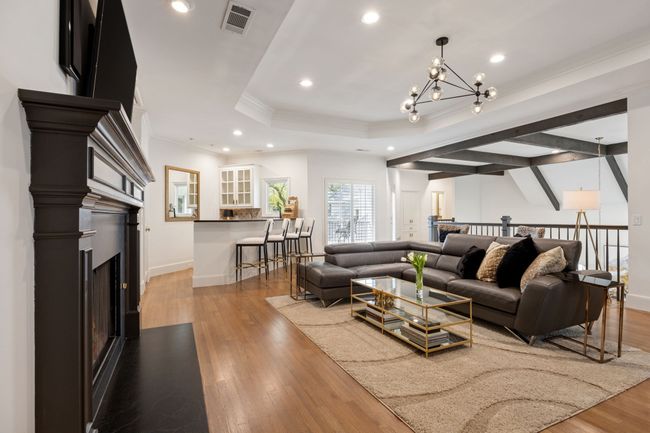 Second floor living area and game room with built in bar | Image 18