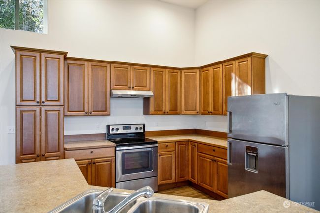 Roomy kitchen. Microwave in the cupboard. | Image 24