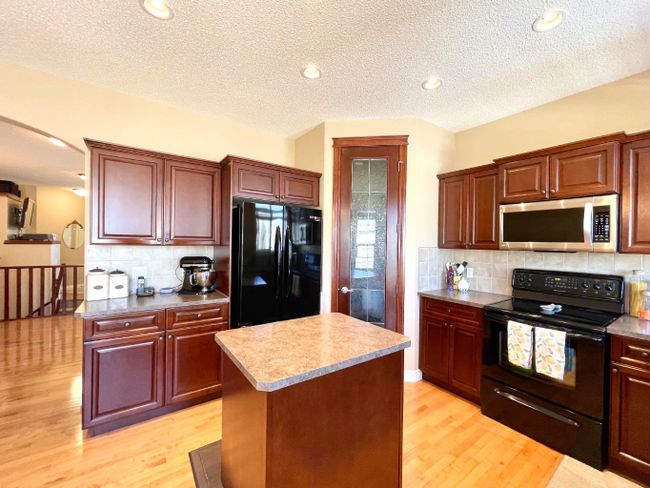 1909 Riverside Drive Nw, Home with 2 bedrooms, 2 bathrooms and 4 parking in High River AB | Image 18