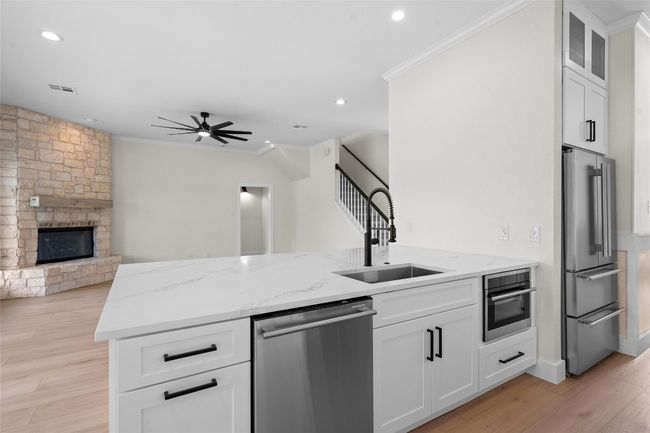 Oversized kitchen counter open to living room | Image 18