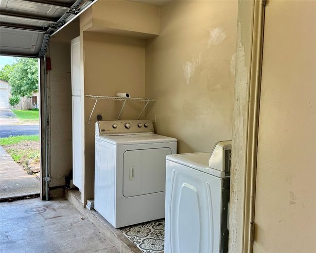 Laundry area with washing machine and dryer | Image 19