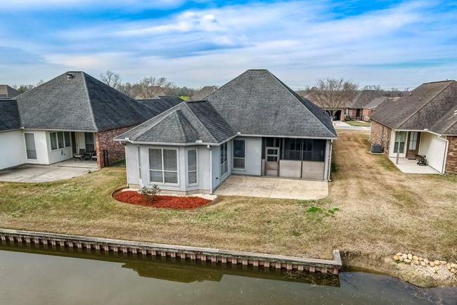 Screened porch, back garden, and bulkhead add to the amenities | Image 33
