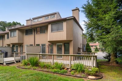 Large Private Deck Overlooking Serene Yard | Image 2