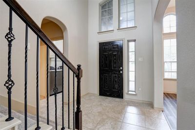 Foyer with plenty of natural light and light tile patterned flooring | Image 3