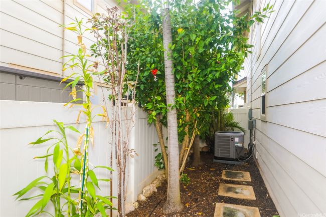 Side of house with AC. | Image 22