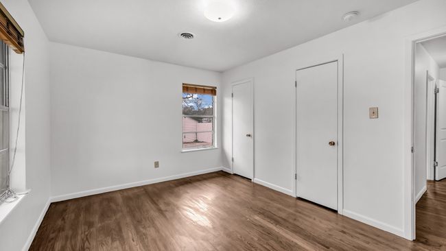 Front bedroom with 2 closet doors to wall length closet | Image 21