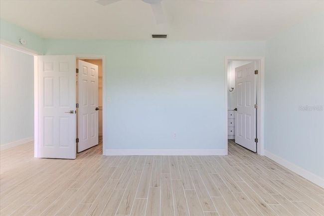 Primary Bedroom to Walk in Closet & Bathroom | Image 25