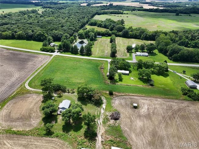 Overview of rural landscape with a pastoral area and abundant farmland | Image 12