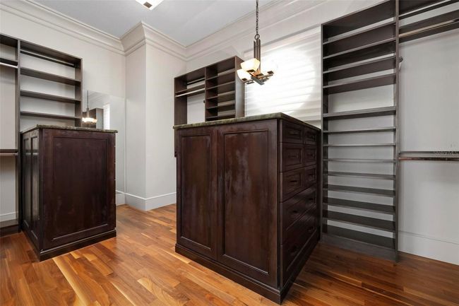 Walk in closet in primary bedroom | Image 45