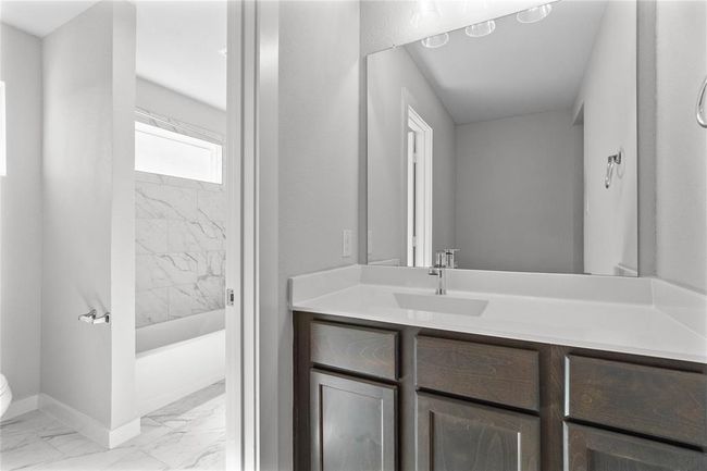 This photo is for illustrative purposes only and is not to be considered an exact replica of the finished home. Rendering does not match the finished product in terms of features, colors, landscaping, etc. Pricing, specifications, square footage and materials are subject to change at any time and without notice. | Image 14