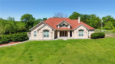 View of front of house featuring a front lawn | Image 1