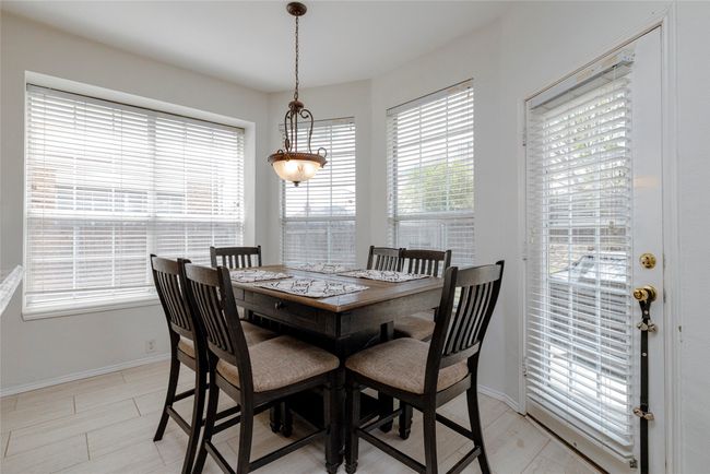 Dining room featuring baseboards | Image 16