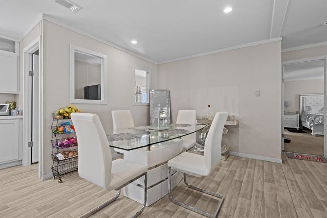 The centerpiece is a spacious 2, 061 sq ft manufactured home, just 1.5 years old, with 4 bedrooms, 2 bathrooms, and a beautifully crafted 40' x 20' stone outdoor kitchen under a covered roof with lighting—ideal for hosting under the stars. | Image 7