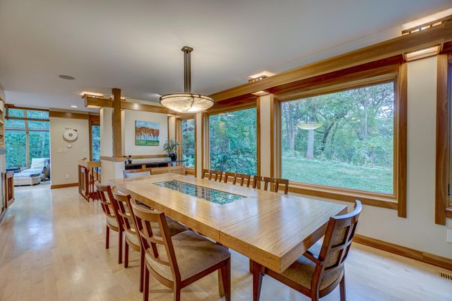 Formal dining space-maple floors with walnut accents | Image 11