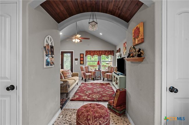 Archway that connects living room and sitting room | Image 10