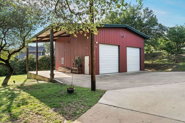 Boat, Car, RV parking in the oversized garage & workshop with office! | Image 6