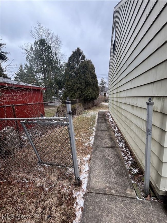 View of yard with fence | Image 26
