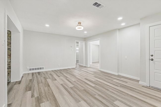 Unfurnished room featuring recessed lighting, visible vents, baseboards, and light wood-style floors | Image 24