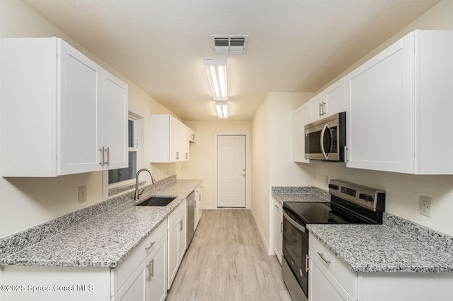 158 Billiar Ave Ne, House other with 3 bedrooms, 2 bathrooms and null parking in Palm Bay FL | Image 10