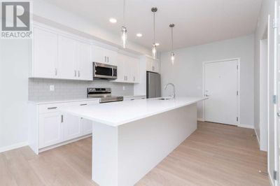 220 Seton Grove Se, Condo with 1 bedrooms, 1 bathrooms and 1 parking in Calgary AB | Image 2