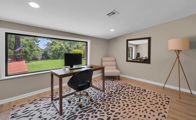 Exercise area with a textured ceiling and recessed lighting | Image 13