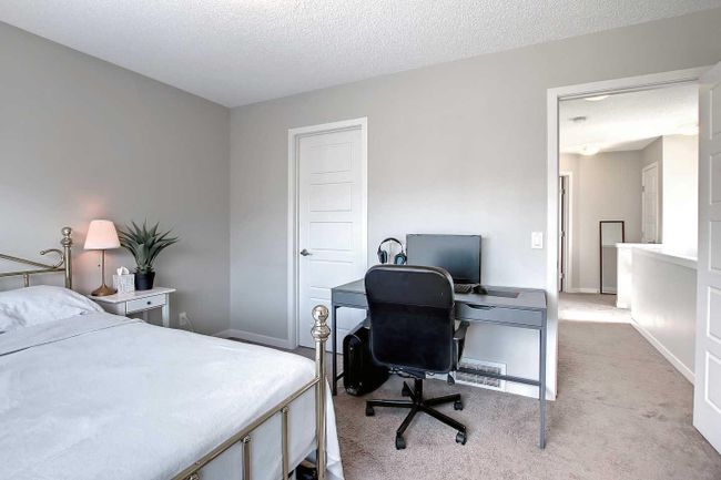558 Panatella Walk Nw, Home with 2 bedrooms, 2 bathrooms and 3 parking in Calgary AB | Image 16