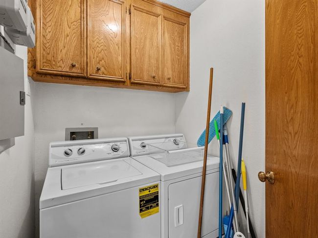Laundry room is off of the kitchen | Image 23