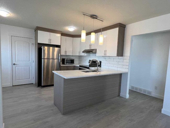 6132 Madigan Drive Ne, Home with 5 bedrooms, 2 bathrooms and 2 parking in Calgary AB | Image 6