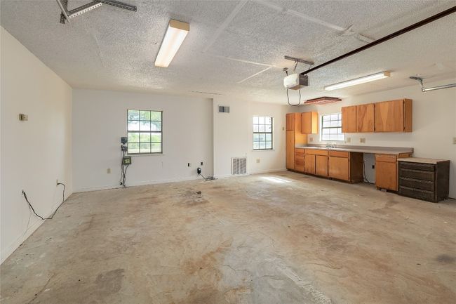 Two car Garage (Owners used as living space while home was built). | Image 26