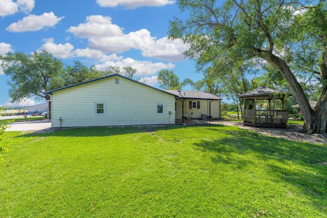 Back of house with a gazebo and a lawn | Image 28