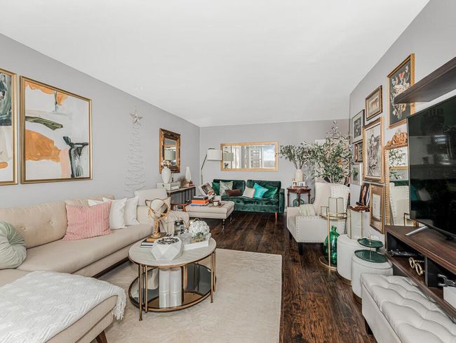 Living room featuring wood finished floors | Image 9