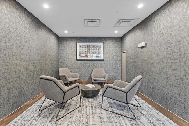 Living area featuring wood finished floors and recessed lighting | Image 35