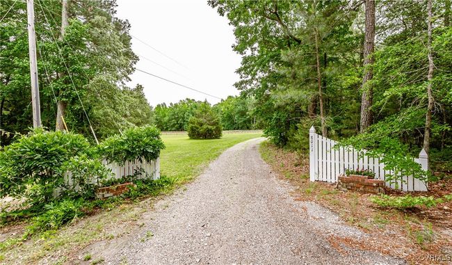 View of street featuring a wooded view | Image 45