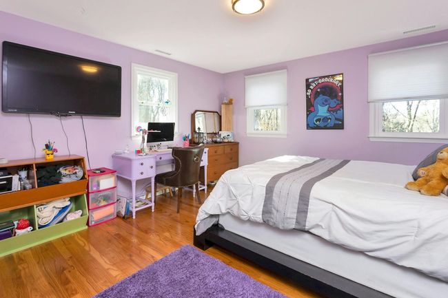 Second of four bedrooms with large double door closet. | Image 18