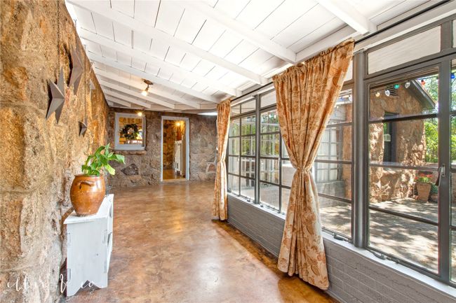 Want to kick back & read with a cup of tea, fill the room with orchids & plants- this is perfect! | Image 7
