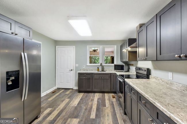 1069 Shellman Hammock Dr Ne, House other with 2 bedrooms, 2 bathrooms and null parking in Townsend GA | Image 11