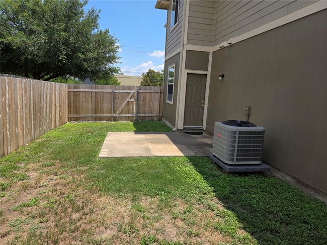 Fenced backyard featuring a patio | Image 5