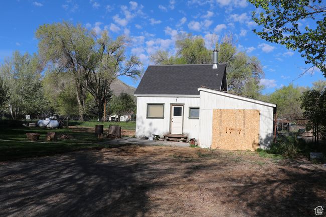 Garage featuring fence | Image 43