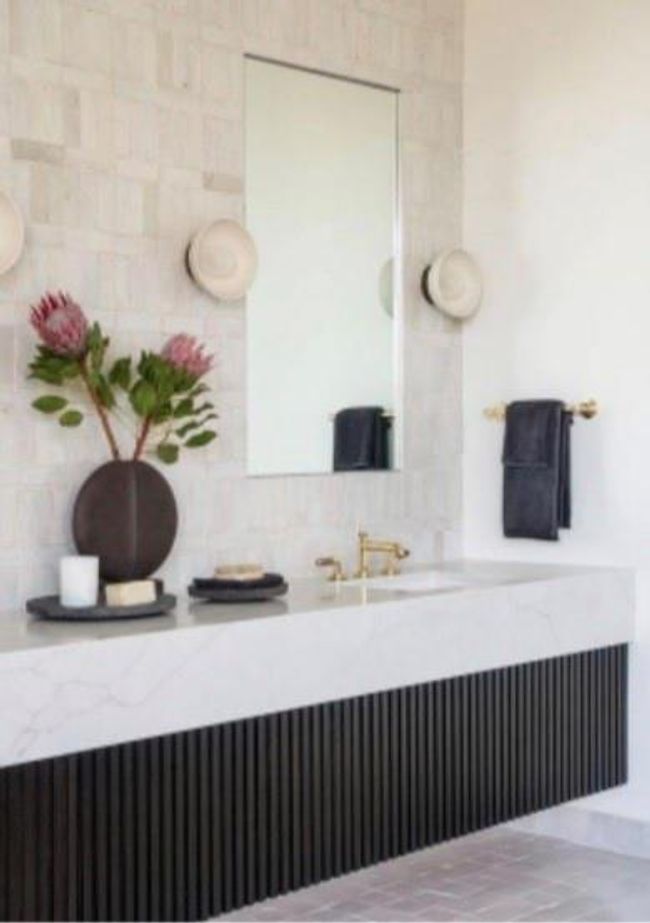 Bathroom with tasteful backsplash and vanity | Image 5