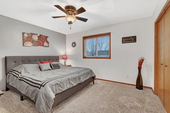 Primary bedroom connected to walk-through bathroom | Image 13
