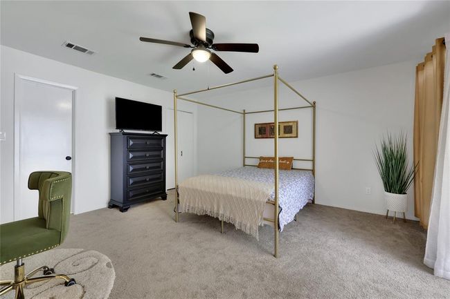 Spacious primary bedroom | Image 16