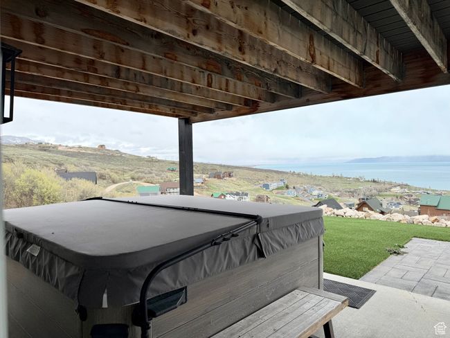Exterior space with a water view and a hot tub | Image 44
