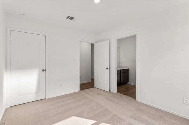 Unfurnished bedroom with carpet flooring and ensuite bathroom | Image 27
