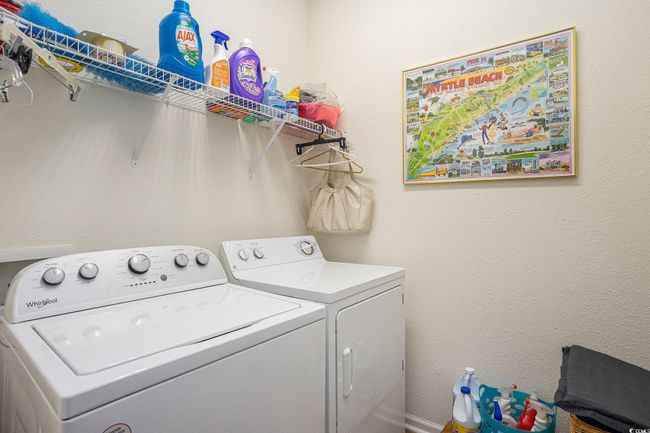 Laundry room with separate washer and dryer | Image 23